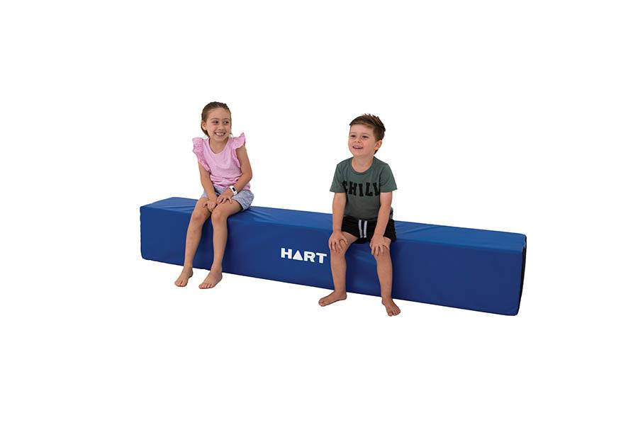 HART foam bench with cushioned seat and wooden legs, ideal for seating or decor in a modern interior.